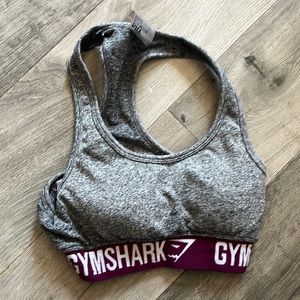 Grey Gymshark bra with branding around waistband